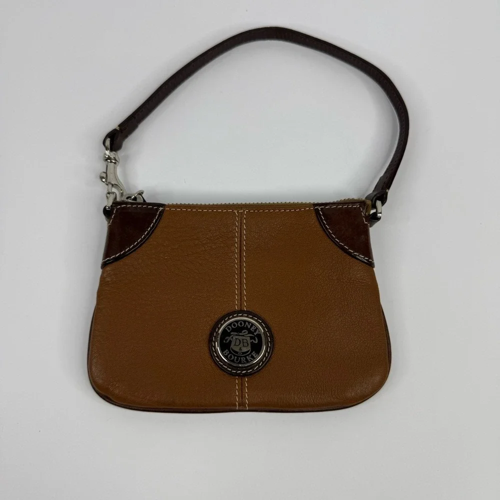 Dooney & Bourke Brown Pebble Leather Wristlet Medallion Logo Zipper